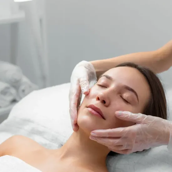 beautician-with-female-client-salon-face-care-routine-1