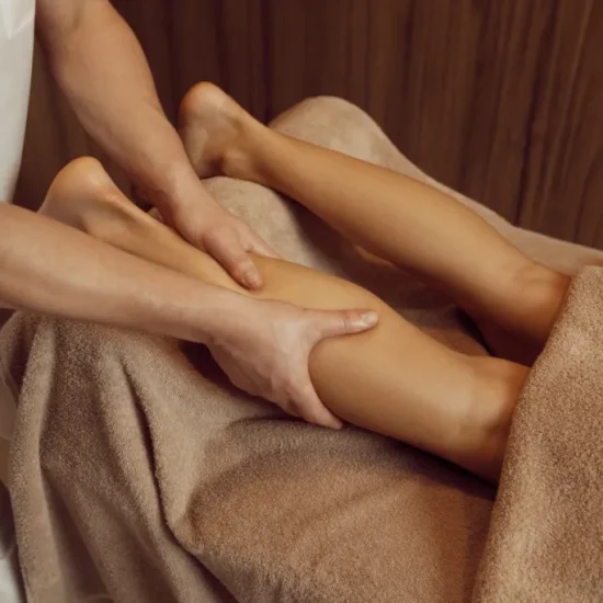 male-masseur-pampering-legs-young-woman-towel-closeup-view-professional-massage-massaging-relaxation-therapy-body-skin-care-attractive-lady-spa-salon